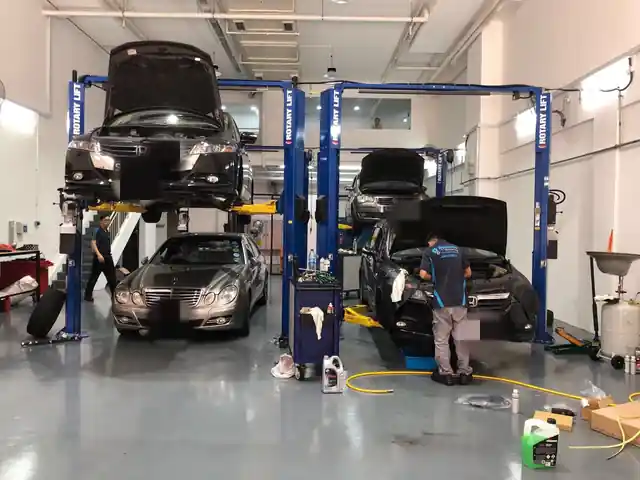 Car lifts in the Jacky Gearbox workshop